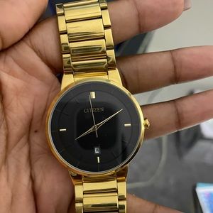 Gold Citizen Watch with a Black face